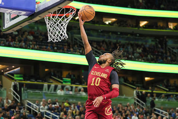 Dec 11, 2023; Orlando, Florida, USA; Cleveland Cavaliers guard Darius Garland (10) goes to the basket during the first quarter against the Orlando Magic at Amway Center.